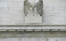 Federal Reserve holds interest rates while signalling hike in March